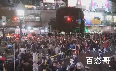 日本上万球迷街头狂欢 防暴警察出动 日本明天还不放假吗